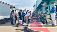 AJM dan Polres Manggarai Gelar Bakti Sosial Pengecatan Trotoar di Wilayah Pertokoan Kota Ruteng