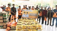 Harapan di Tengah Banjir: Plt. Camat Tanah Abang Hadiri Penyerahan Bantuan di Desa Tanjung Dalam