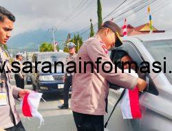 Dalam Rangka HUT RI ke-80, Polres Manggarai Bagikan Bendera Merah Putih kepada Pengendara Bermotor